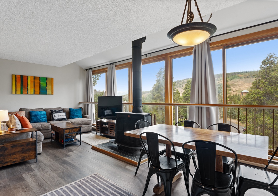 Unwind in your bright, open living space where panoramic mountain views frame every moment of relaxation and dining.