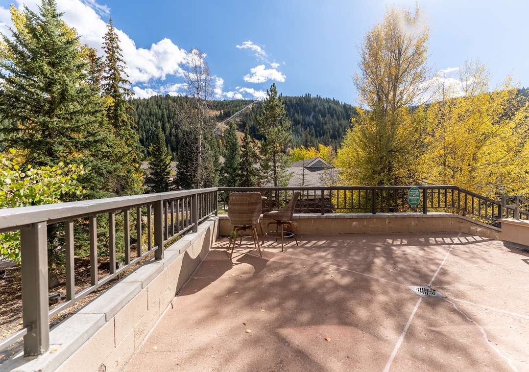 Your private terrace offers stunning mountain views surrounded by autumn foliage, perfect for morning coffee or evening relaxation.