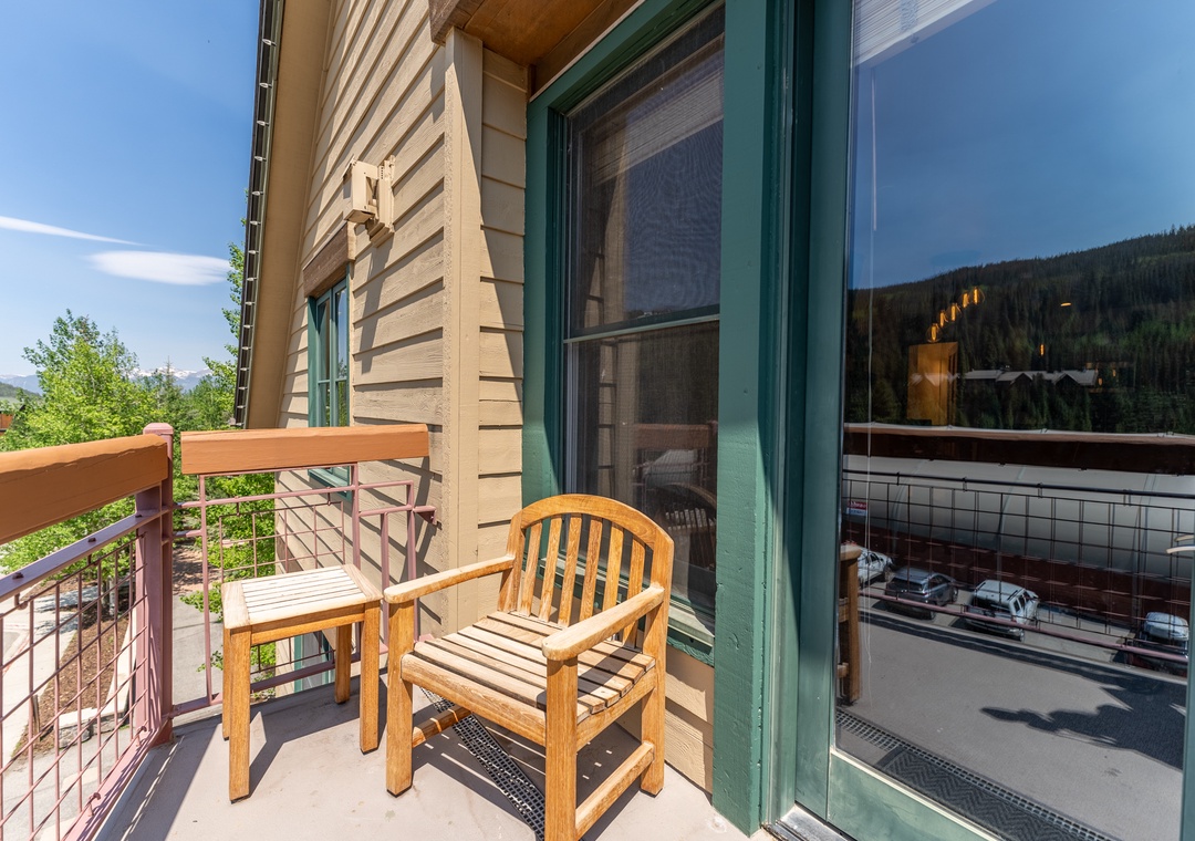 Step onto your private balcony with mountain views, where you can unwind in comfortable seating and watch the world go by below.