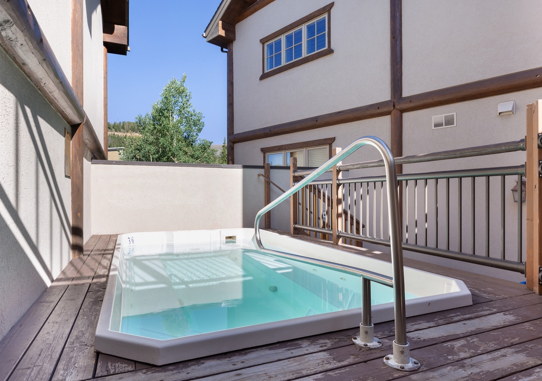 Slip into your private hot tub on the wooden deck, where warm bubbles and mountain views create the perfect retreat.