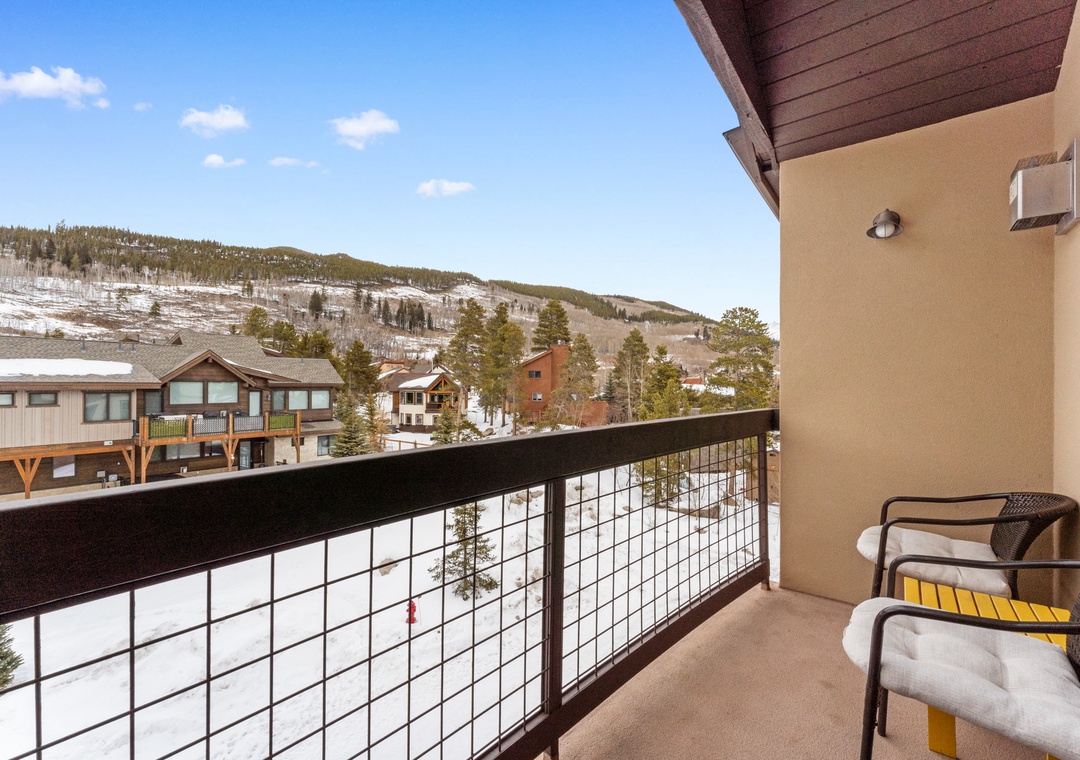 Step onto your private balcony to breathe in crisp mountain air while taking in stunning snowy slopes and valley views.