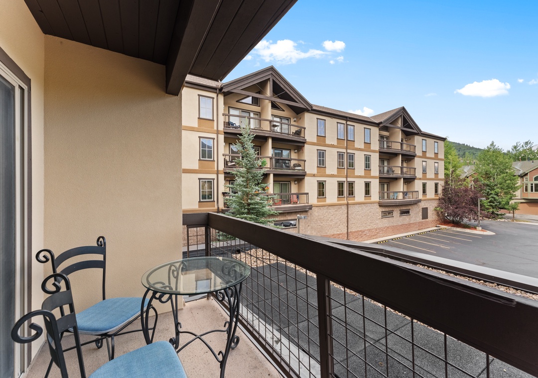 Relax on your private balcony with mountain views, complete with a charming bistro table for morning coffee or evening drinks.