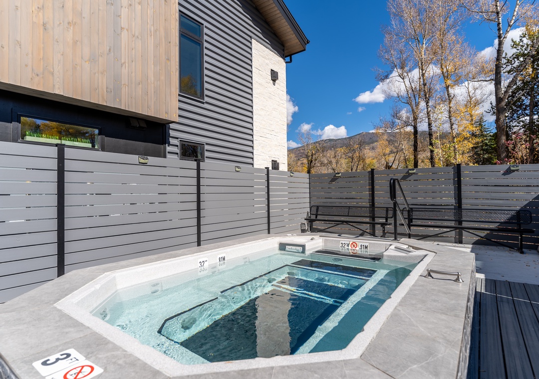 Unwind in your private hot tub, soaking in warm bubbles while surrounded by mountain views and crisp alpine air.