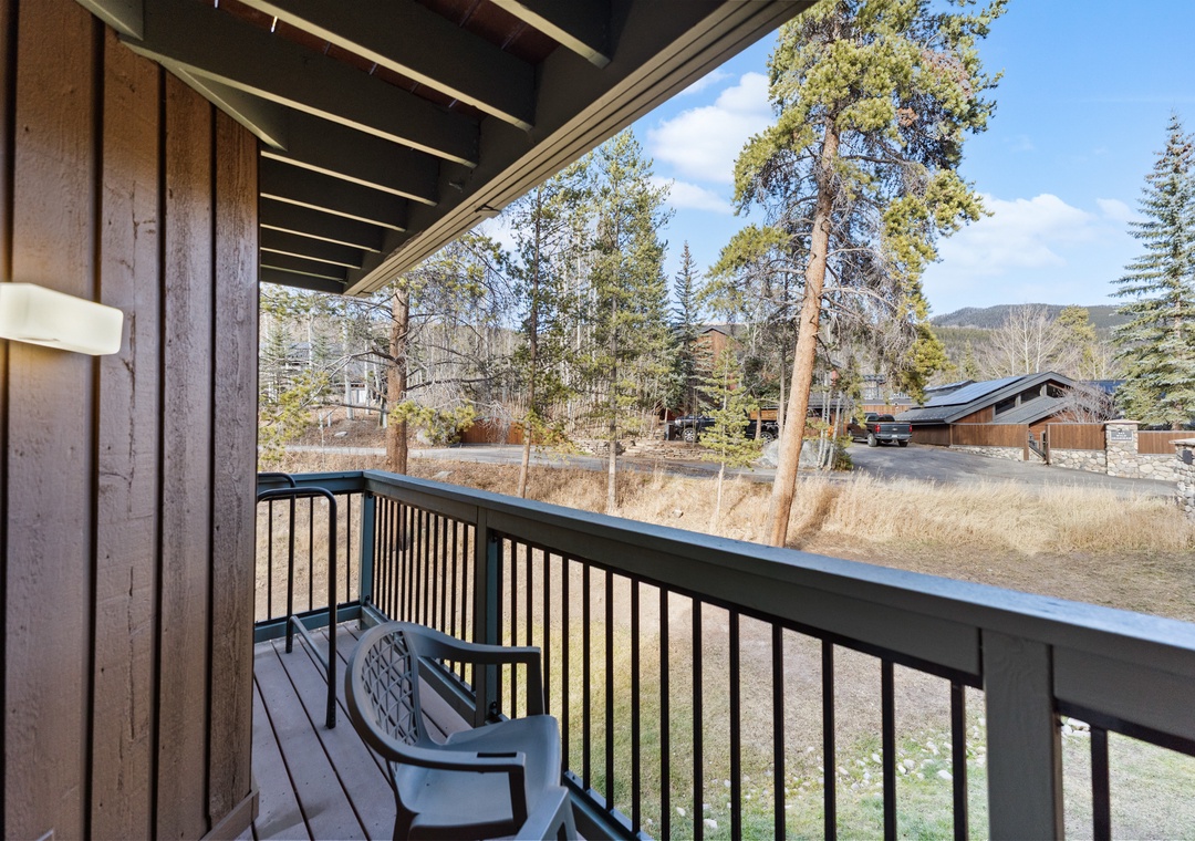 Step onto your private balcony and breathe in the crisp mountain air while enjoying peaceful views of towering pines and rolling hills.