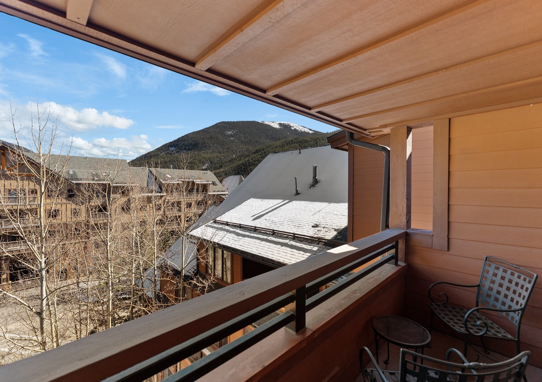 Relax on your private balcony with stunning mountain views while enjoying morning coffee at your bistro table.