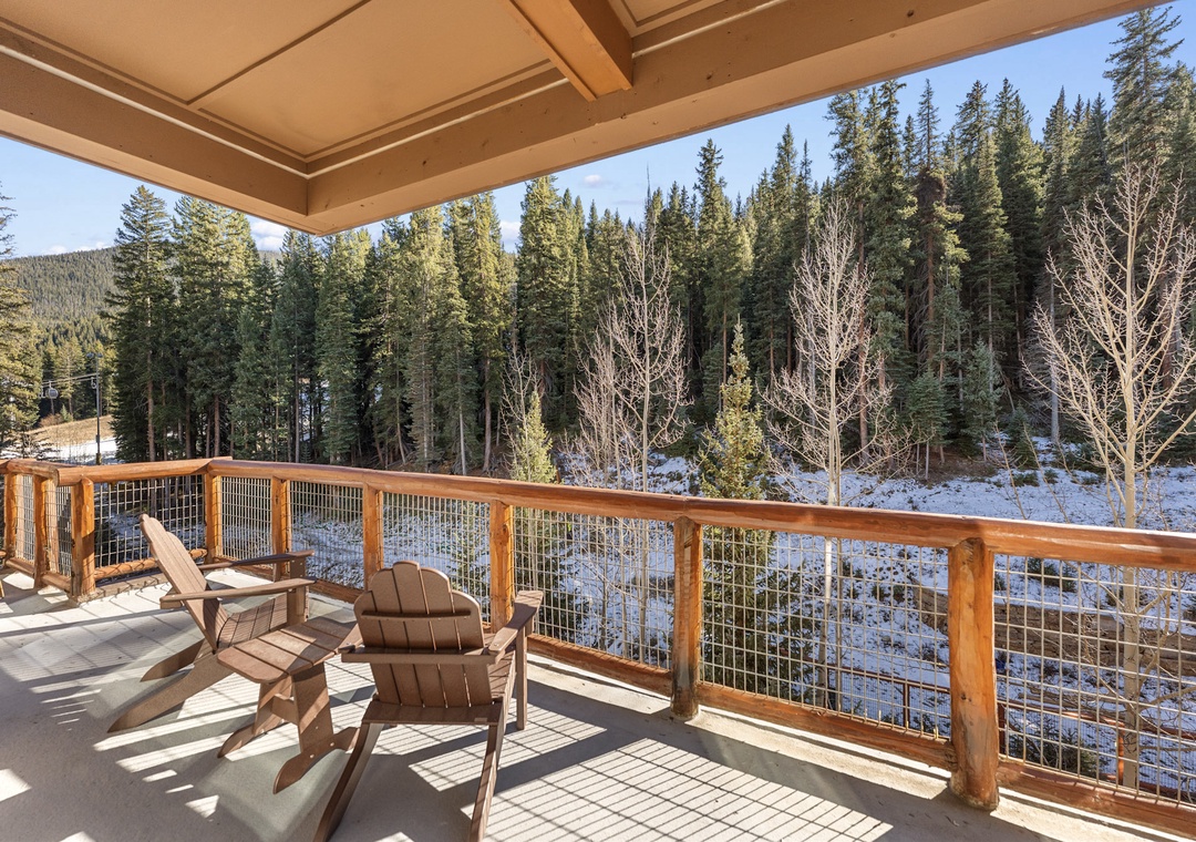 Relax in your private balcony chairs while soaking up mountain forest views and crisp winter air.