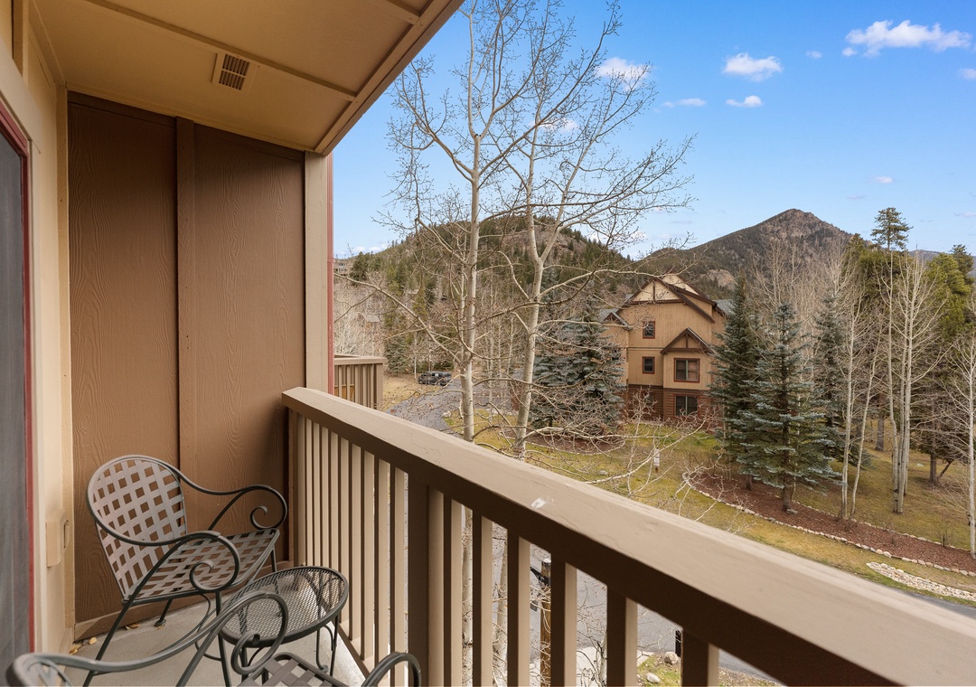 Step onto your private balcony and breathe in the crisp mountain air while taking in stunning views of the surrounding peaks and forest.