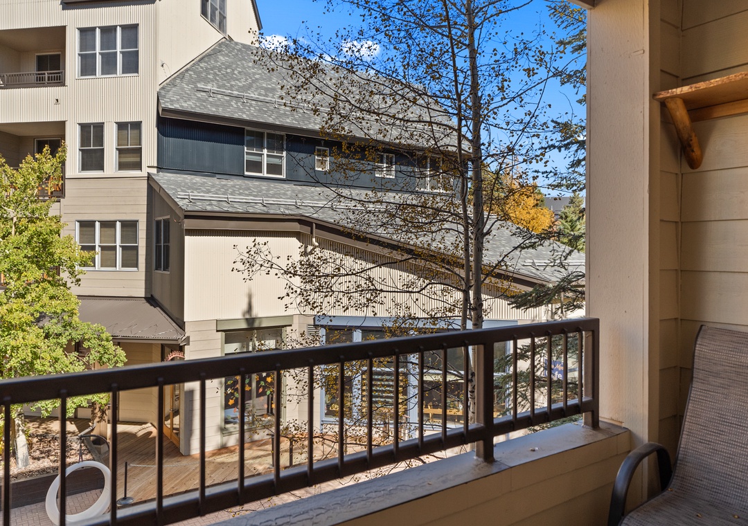Step onto your private balcony and soak in the peaceful neighborhood views through the trees.