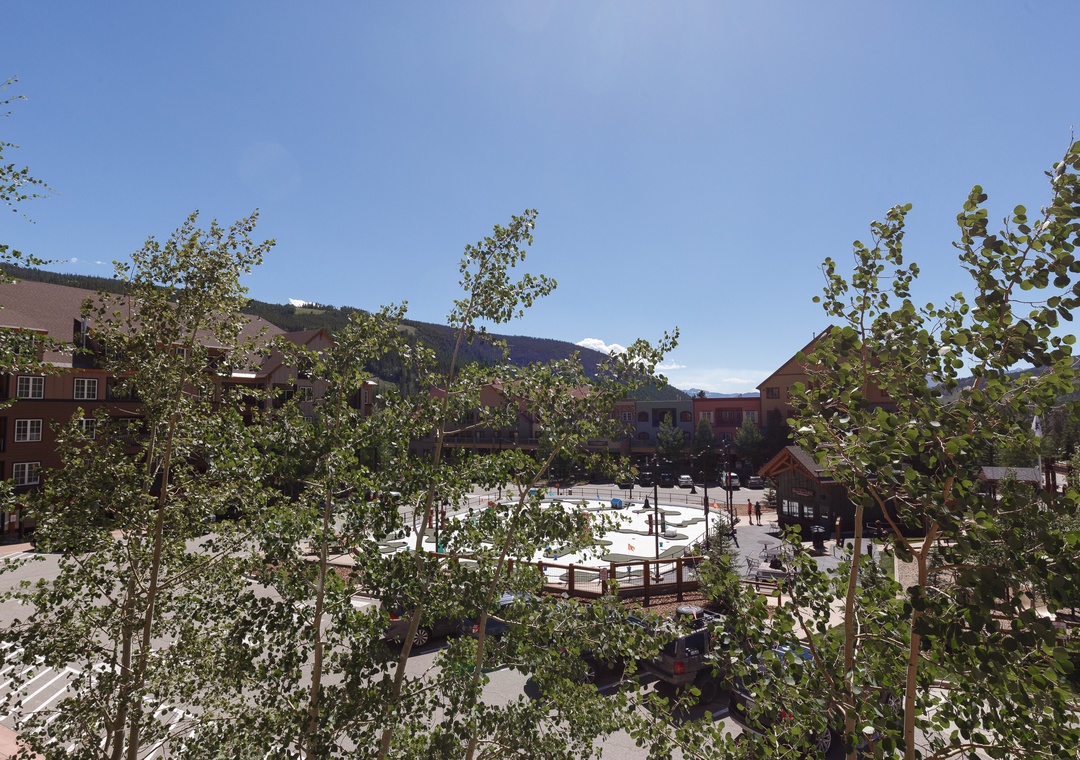 Mountain resort complex featuring multiple buildings, outdoor recreation areas, and scenic alpine surroundings perfect for exploring.