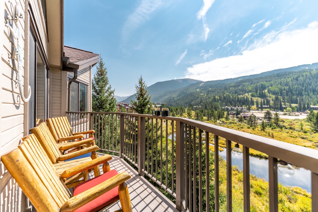 Relax on your private balcony with stunning mountain and lake views stretching across the valley below.