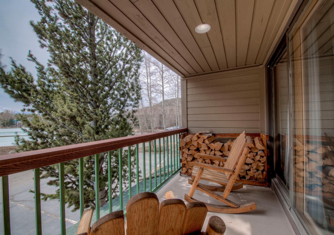 Your private balcony features a cozy rocking chair where you can unwind while enjoying peaceful winter views.