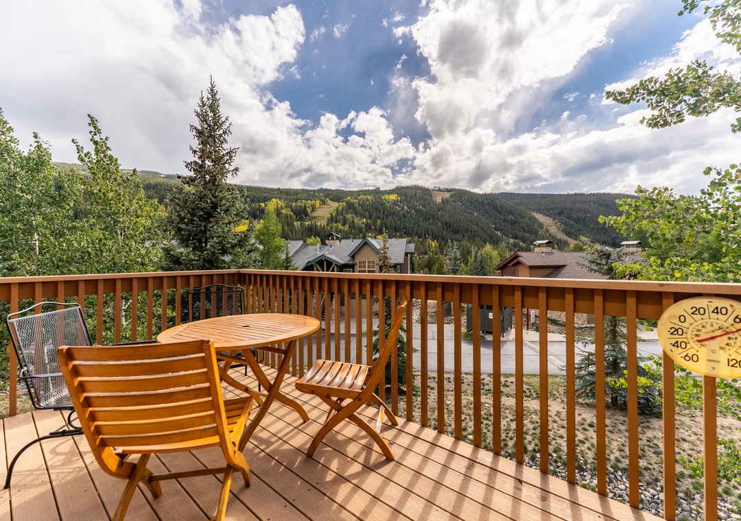Sip your morning coffee on this sunny deck while soaking in breathtaking mountain views and fresh alpine air.