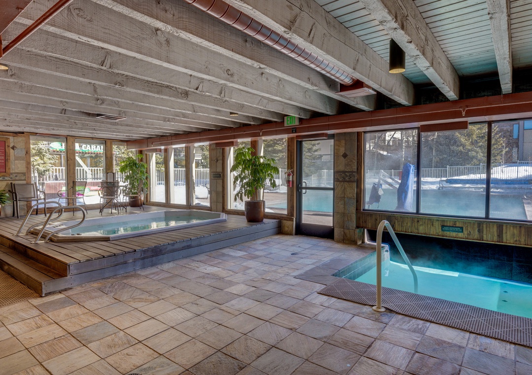 Unwind in your own private spa sanctuary with heated pools and rustic charm beneath exposed beams.