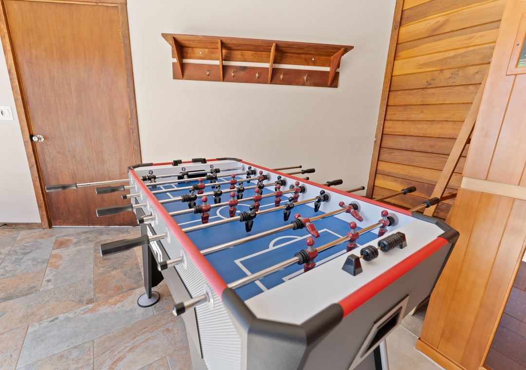 Challenge your crew to a fun match on your private foosball table—a playful retreat after exploring the outdoors.