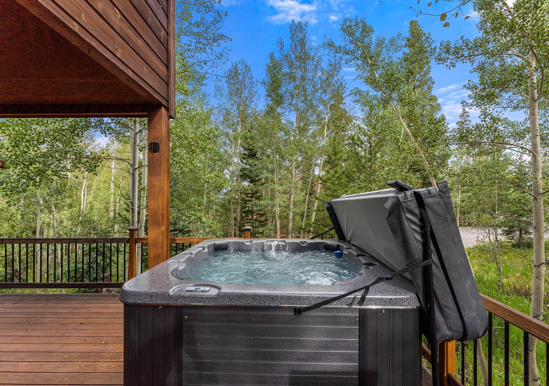 Soak in your private hot tub surrounded by towering aspens and mountain tranquility.