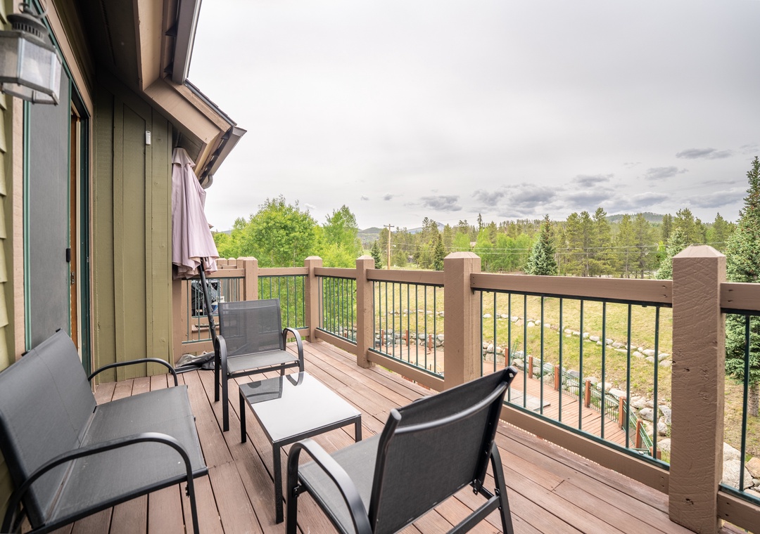 Unwind on your private deck with mountain views, where morning coffee tastes better surrounded by forest scenery and comfortable seating.