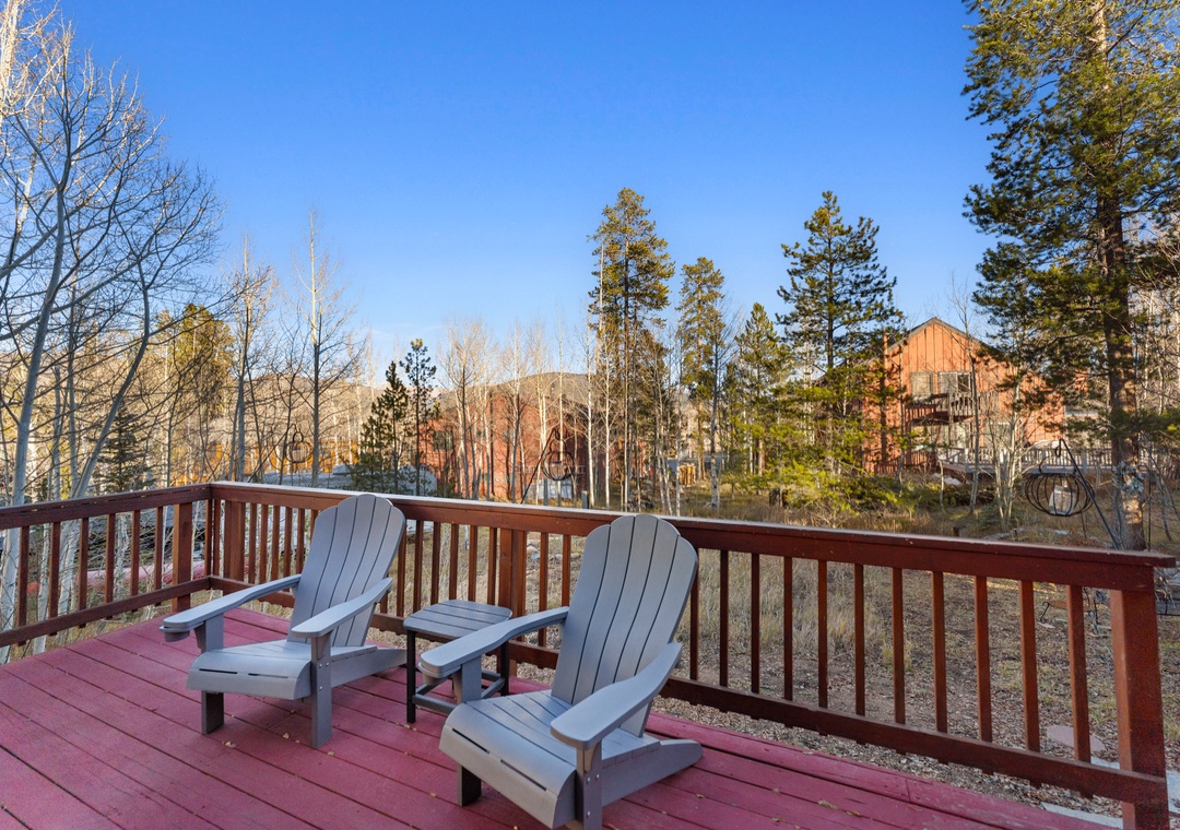 Relax on your private deck with comfortable Adirondack chairs, taking in the stunning forest views and crisp mountain air.