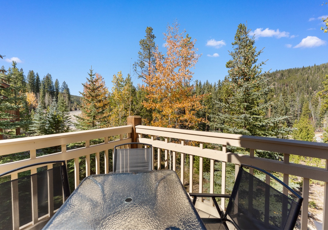 Your private balcony offers stunning autumn views of golden aspens and rolling forest hills—perfect for morning coffee or evening relaxation.