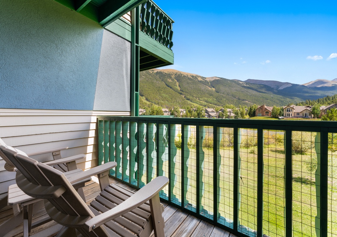 Unwind on your private balcony with stunning mountain views. Two comfortable chairs await as you soak in the peaceful scenery and fresh air.