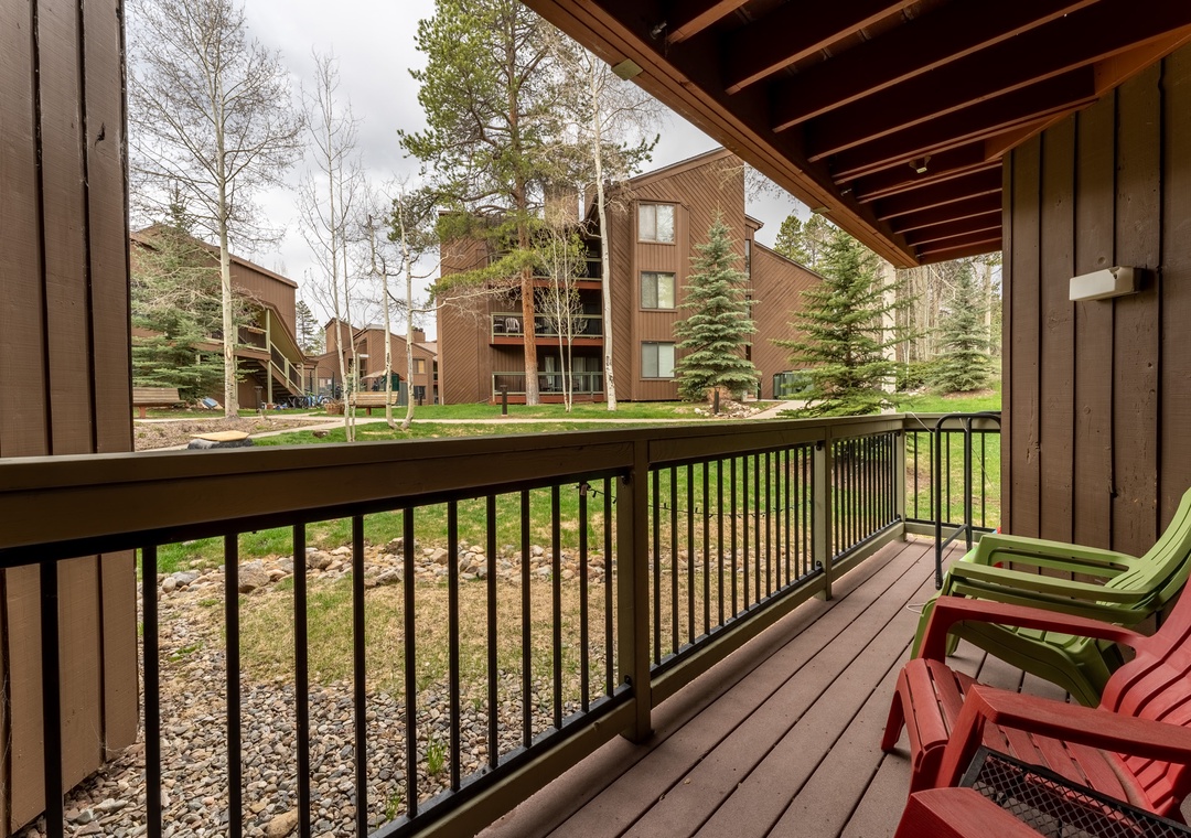 Step onto your private balcony and settle into colorful Adirondack chairs while taking in peaceful views of the landscaped grounds.