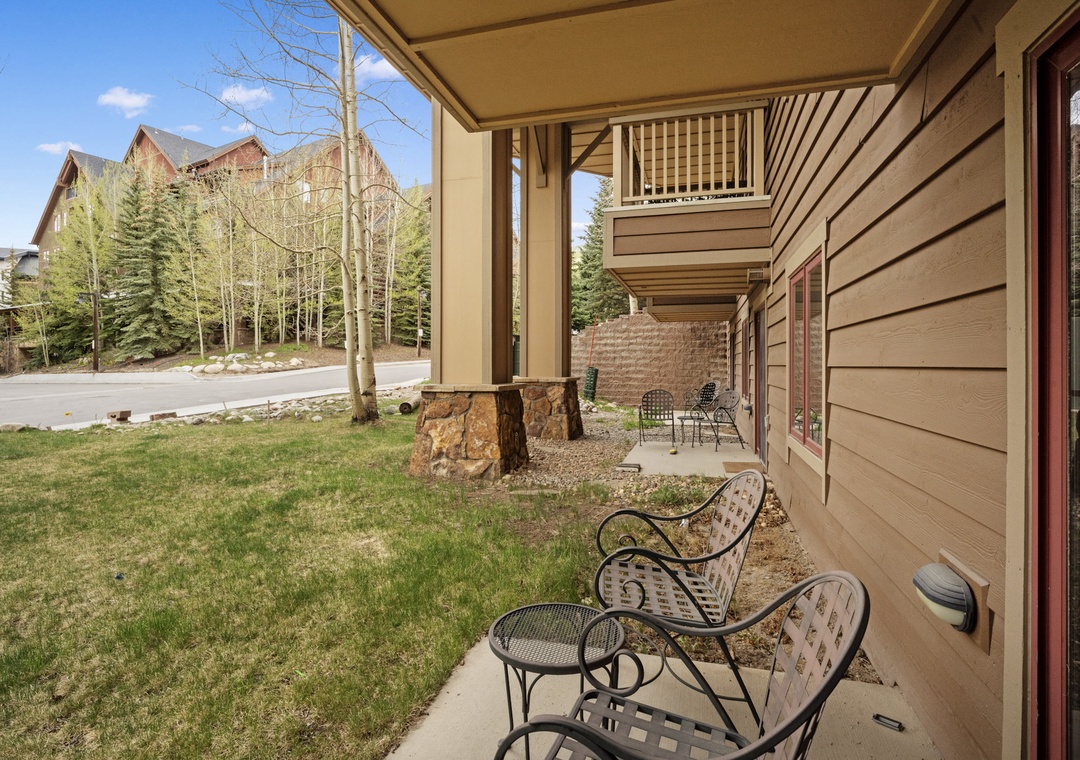 Relax on your private patio with comfy seating and mountain views.