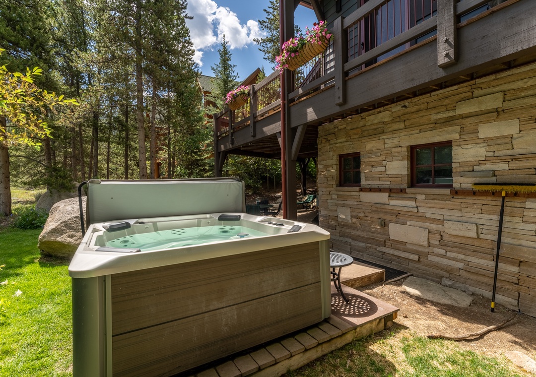 Unwind in your private hot tub while soaking up mountain views and fresh air in this peaceful wooded setting.