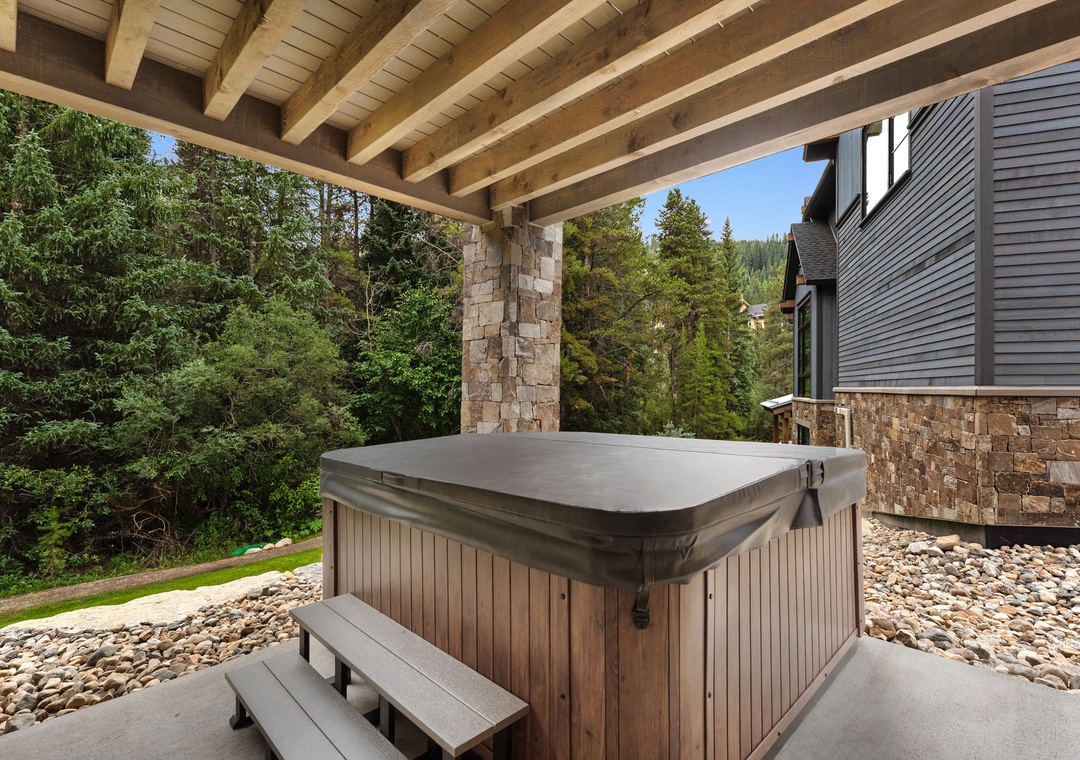 Unwind in your private hot tub surrounded by mountain views and peaceful forest.