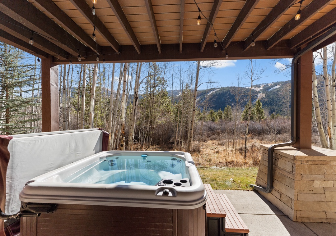 Soak in your private hot tub while taking in breathtaking mountain vistas through towering aspens.