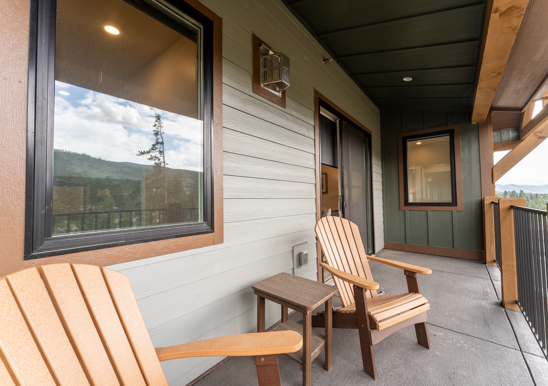 Unwind on your private deck with forest views, where comfortable Adirondack chairs invite you to soak in mountain tranquility.