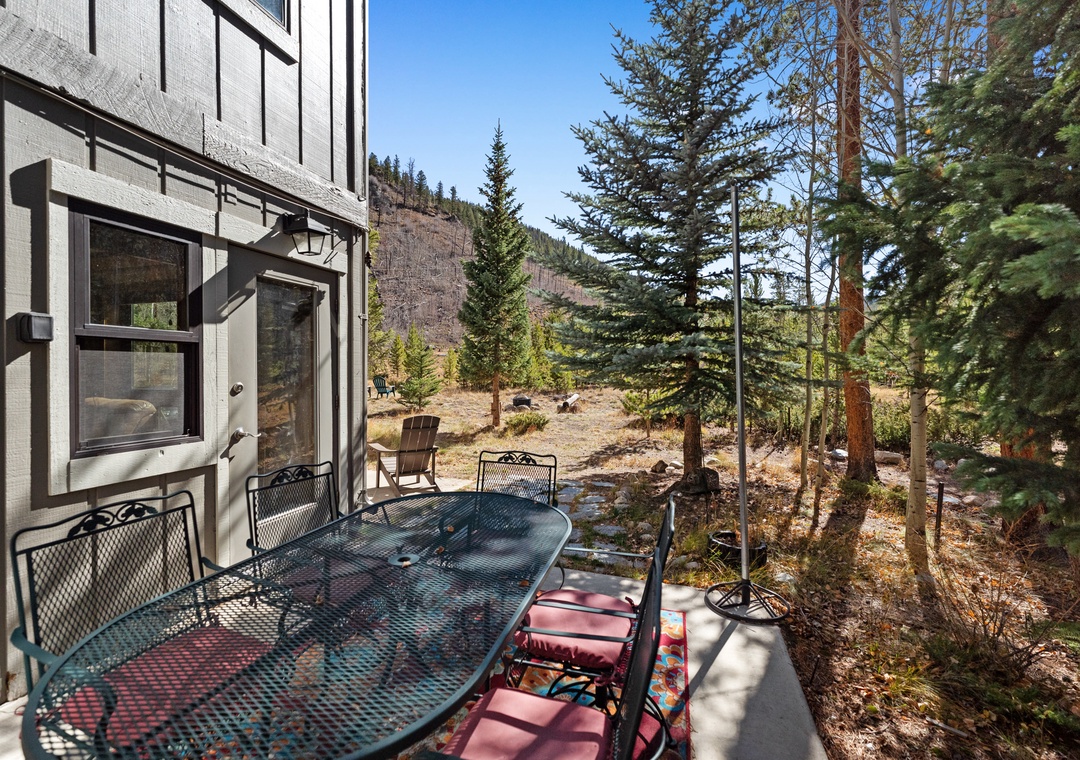 Step onto your private balcony and breathe in the crisp mountain air while enjoying forest views from your outdoor dining space.