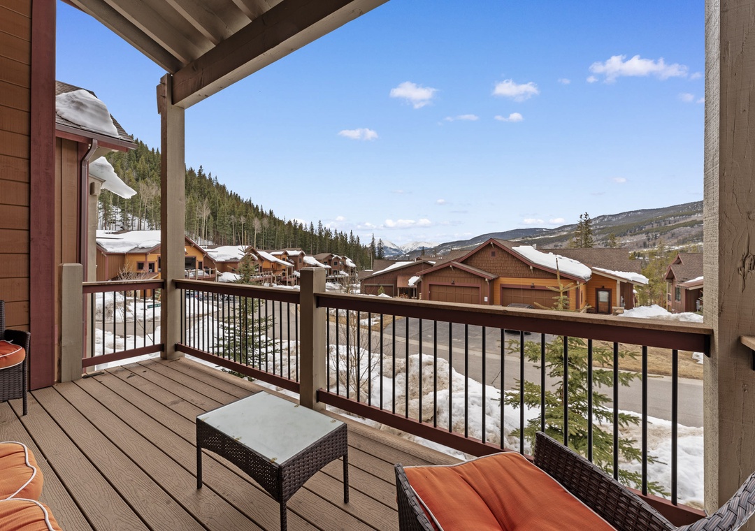 Step onto your private balcony and breathe in crisp mountain air while enjoying stunning views of snow-capped peaks and charming alpine buildings.
