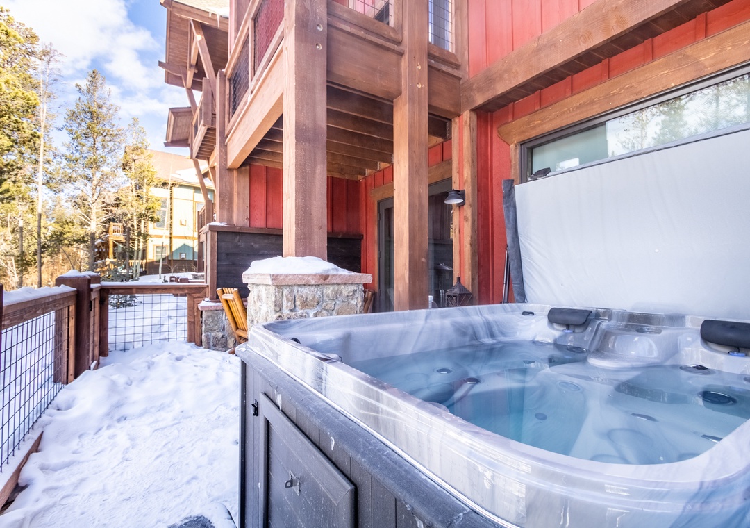 Soak in steaming hot tub waters while snowflakes dance around you on your private deck.