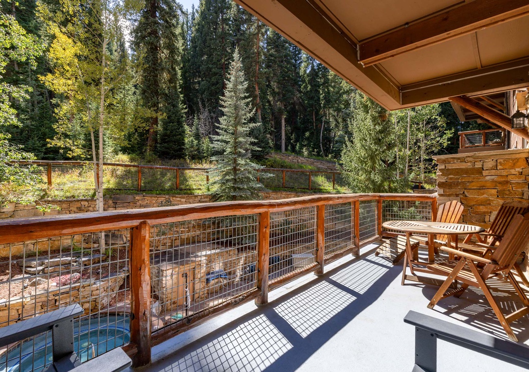 Unwind on your private balcony with forest views, where morning coffee tastes better surrounded by towering pines and peaceful serenity.