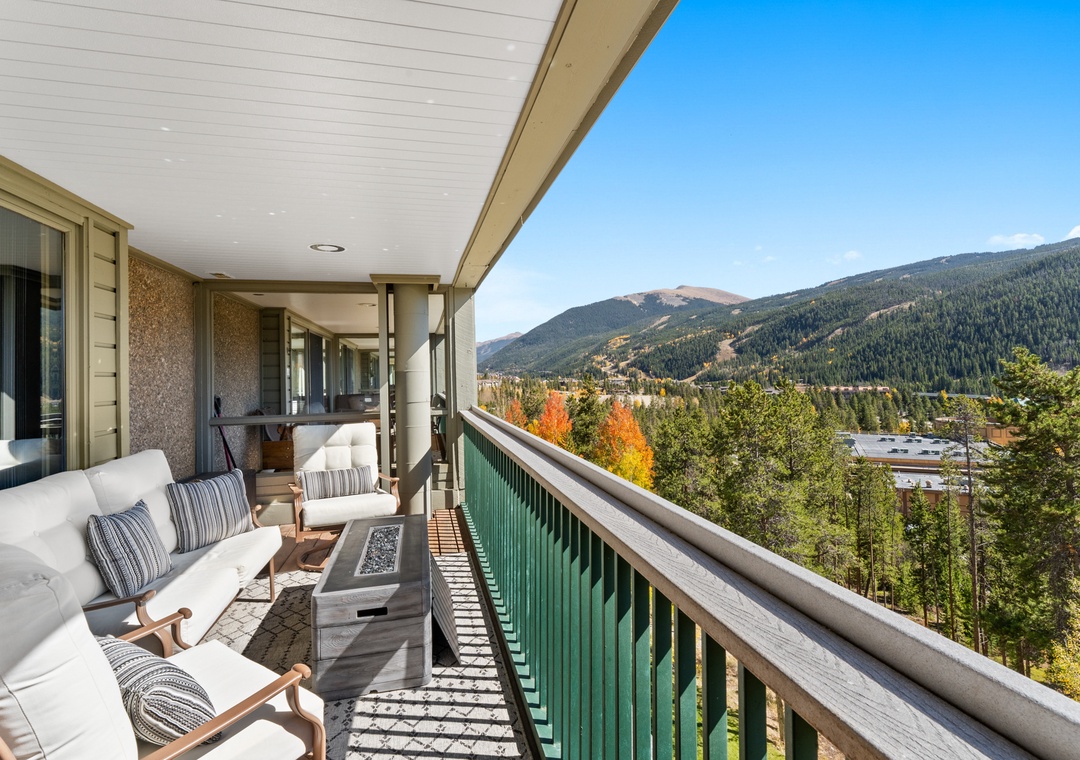 Relax on your private balcony with stunning mountain views and comfortable seating for peaceful moments.