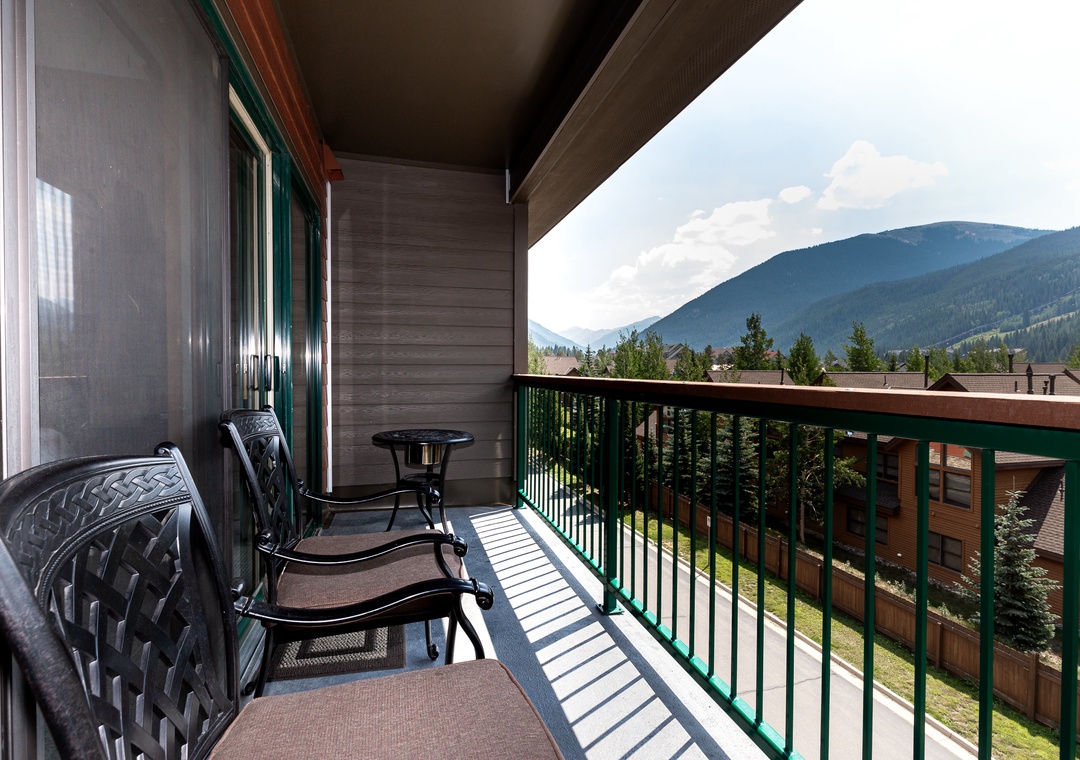 Your private balcony offers comfortable seating and stunning mountain vistas, perfect for morning coffee or evening relaxation.