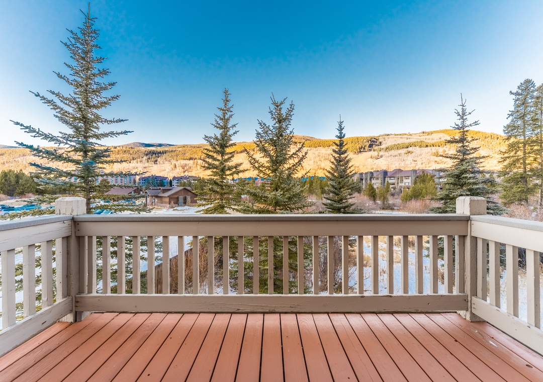 Step onto your private deck and breathe in crisp mountain air while soaking up panoramic views of rolling hills and alpine charm.