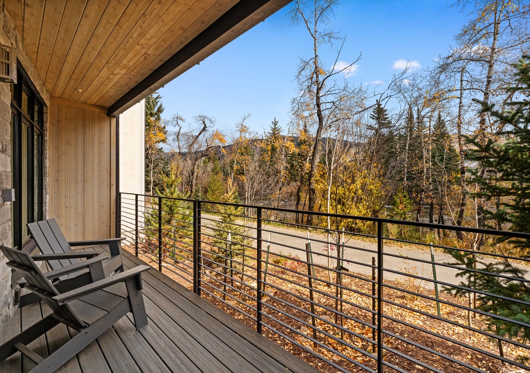 Unwind on your private covered deck with stunning autumn forest views stretching endlessly beyond.
