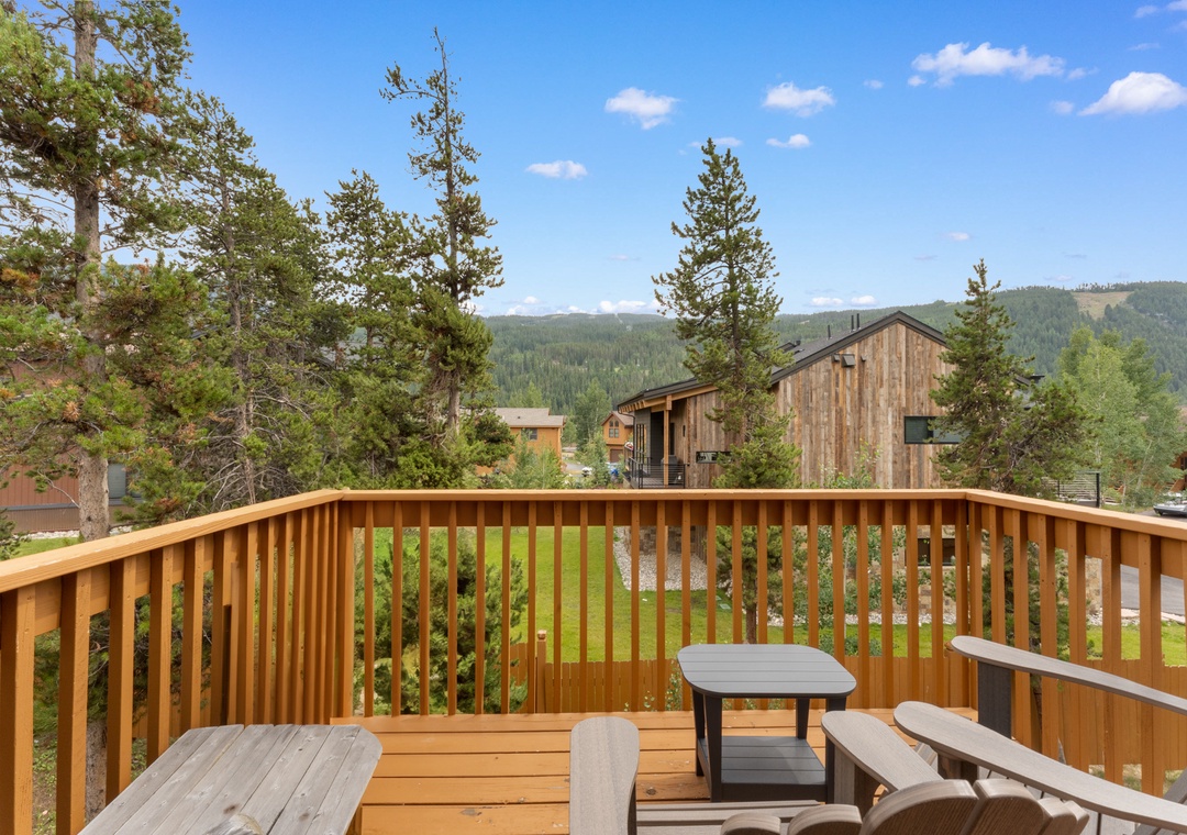 Step onto your private wooden deck with forest views and comfortable seating for peaceful mountain mornings and starlit evenings.