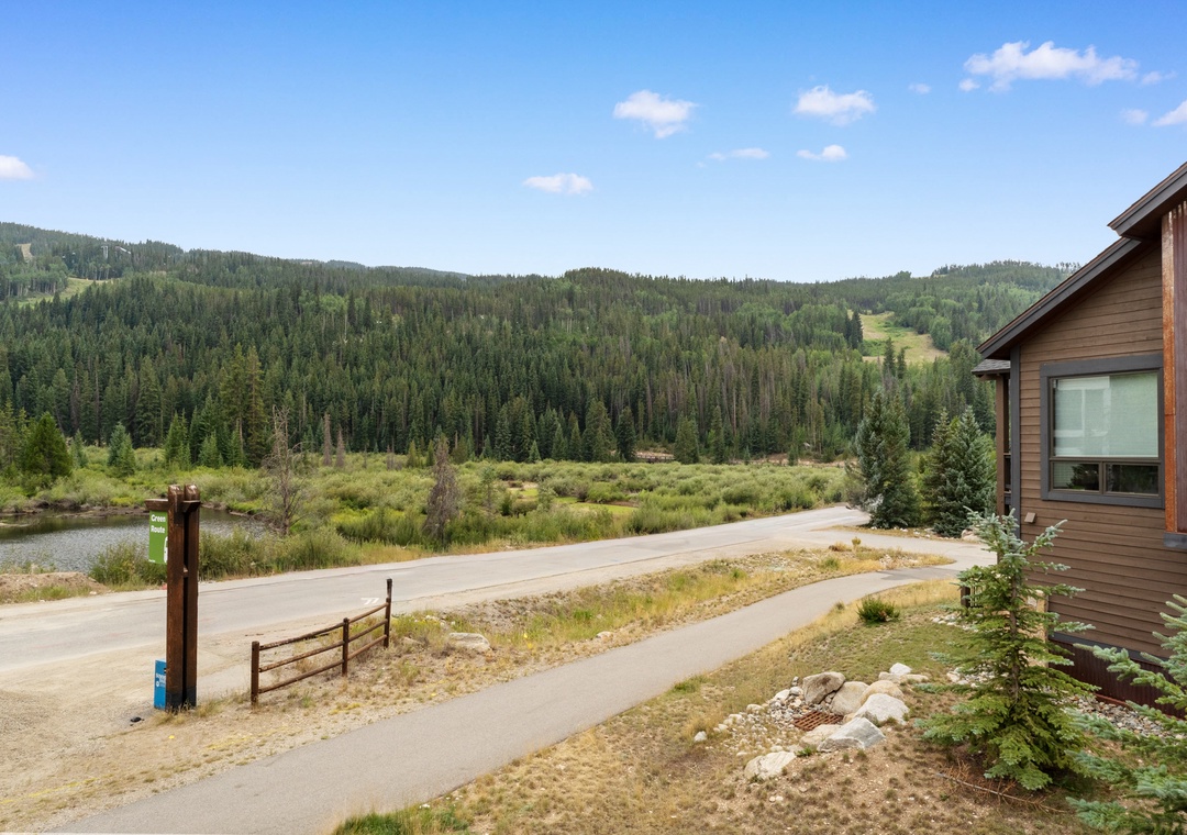 Mountain cabin property surrounded by pristine wilderness, offering stunning forest views and peaceful natural setting.