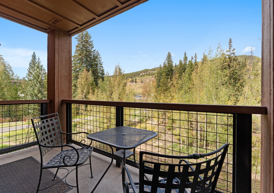 Sip your morning coffee and take in sweeping mountain and forest views from your private covered balcony—the perfect spot to unwind and breathe in the fresh air.