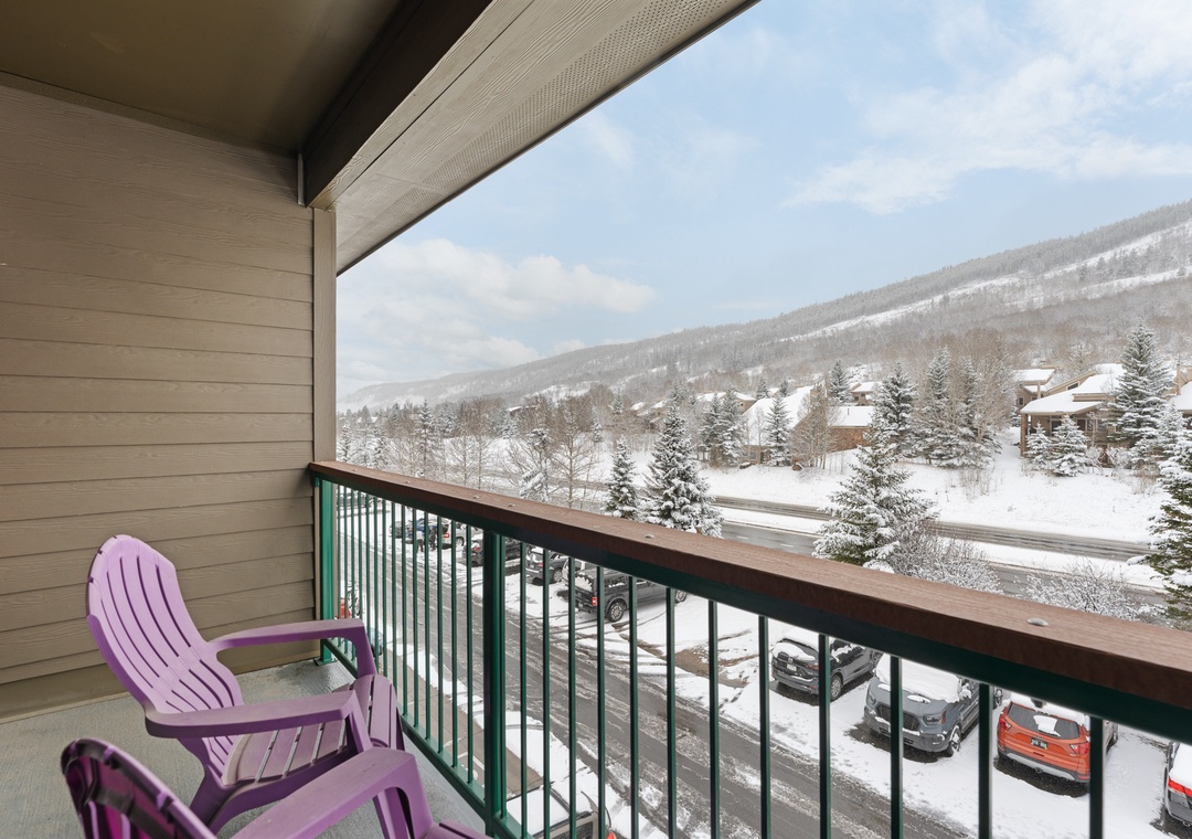 Step onto your private balcony and enjoy breathtaking winter mountain views, where snow-covered peaks and evergreens create a serene alpine escape just for you.