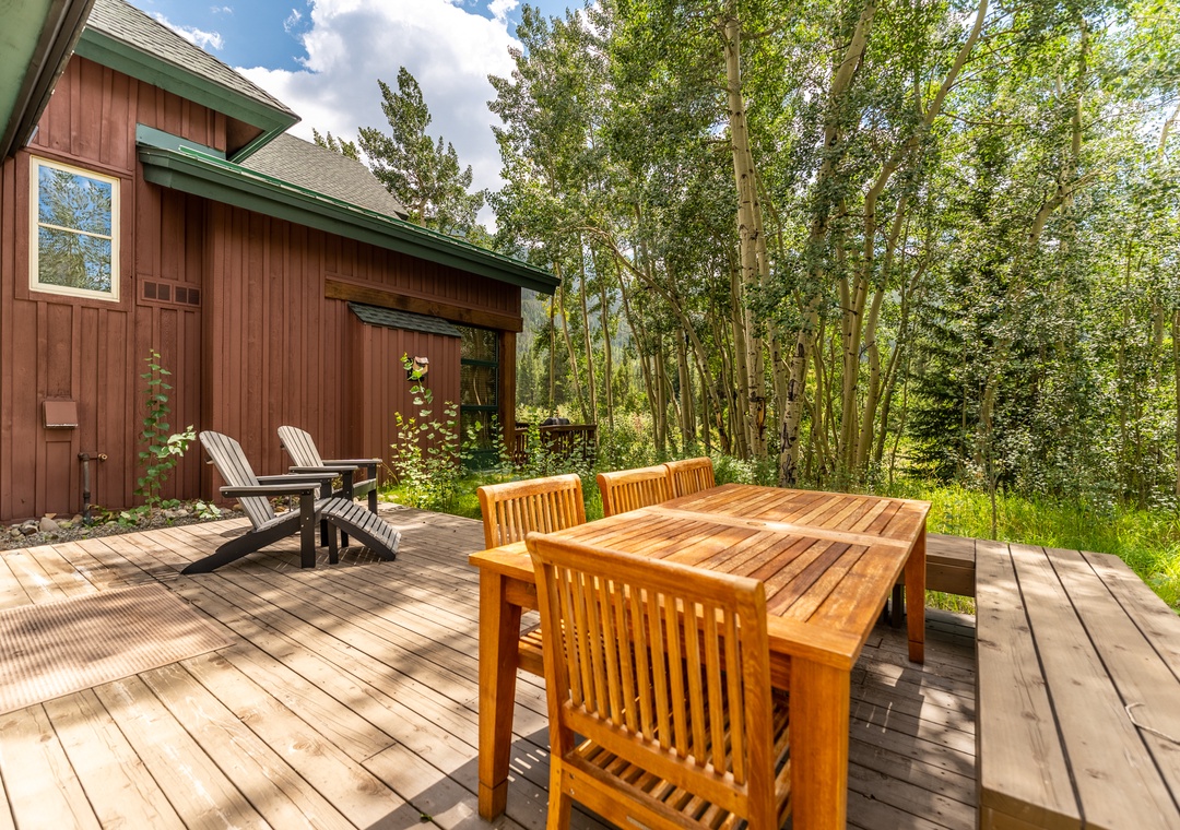 Your private deck offers the perfect spot for morning coffee or evening meals, surrounded by towering trees and nature's tranquil embrace.