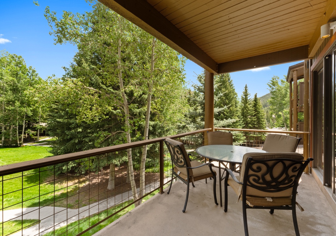 Step onto your private balcony where morning coffee tastes better surrounded by lush trees and peaceful garden views.