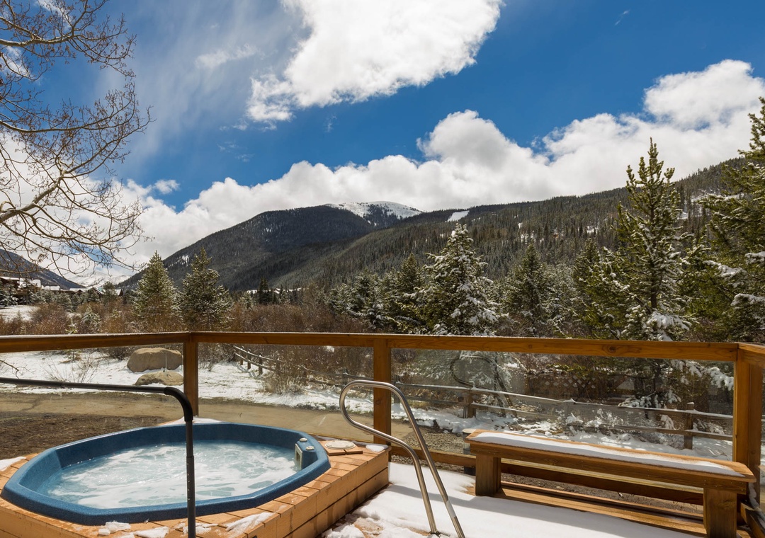 Soak in your private hot tub while snow-capped mountains create a breathtaking backdrop for ultimate relaxation.