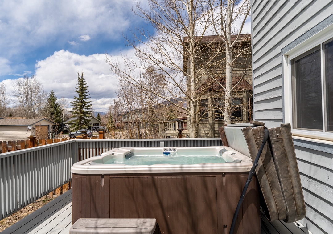 Soak in your private hot tub while enjoying mountain views and crisp fresh air from your deck.
