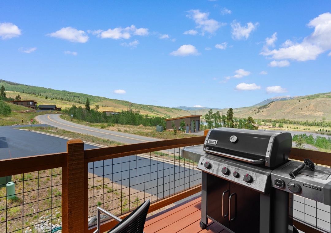 Your private deck features a Weber grill perfect for outdoor cooking while overlooking scenic mountain views, rolling hills, and a peaceful nearby lake.