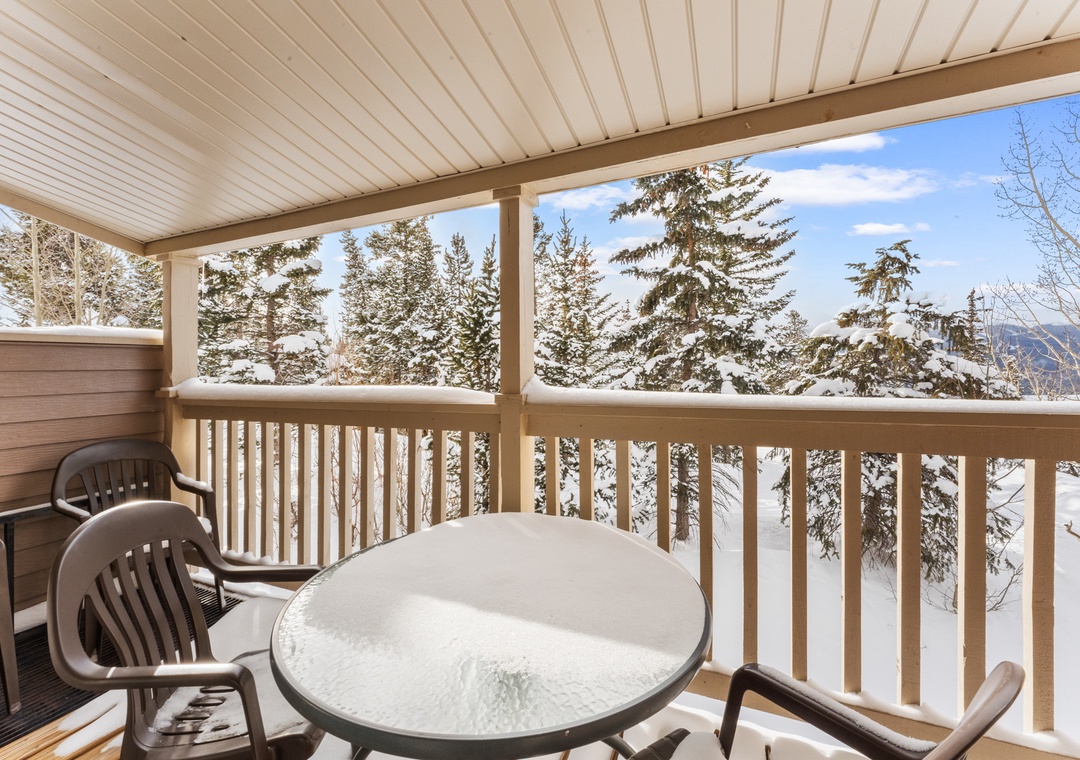 Your private balcony offers stunning winter views of snow-laden evergreens, perfect for morning coffee or evening relaxation.