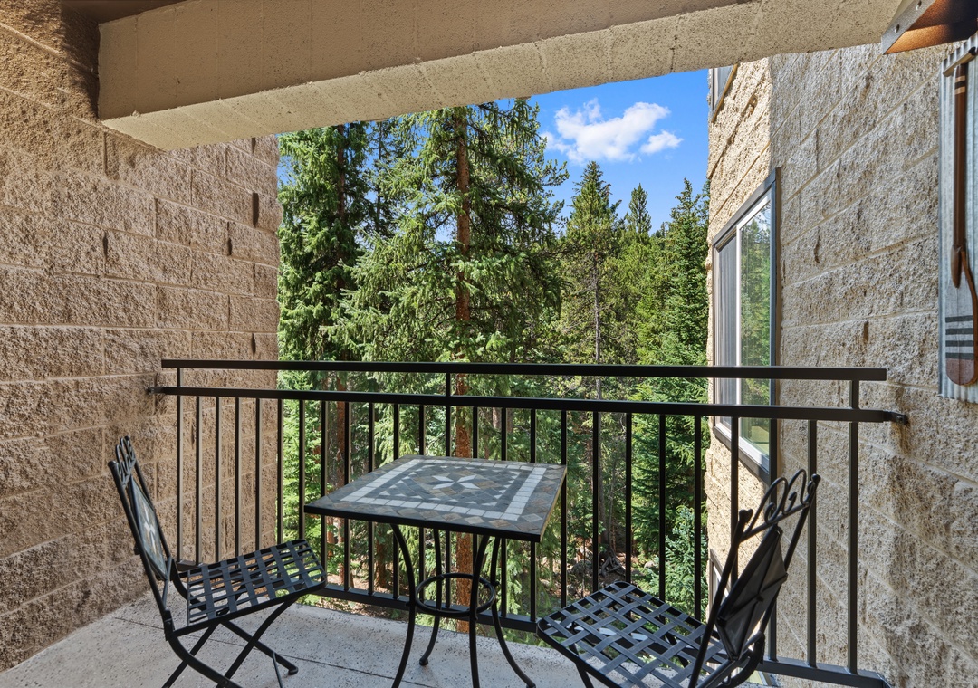 Step out onto your private balcony and breathe in the fresh mountain air. Enjoy your morning coffee at the intimate bistro table while taking in peaceful forest views—your own quiet retreat surrounded by nature.