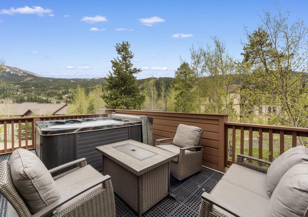Unwind in your private hot tub while soaking up stunning mountain vistas from this perfectly furnished deck retreat.