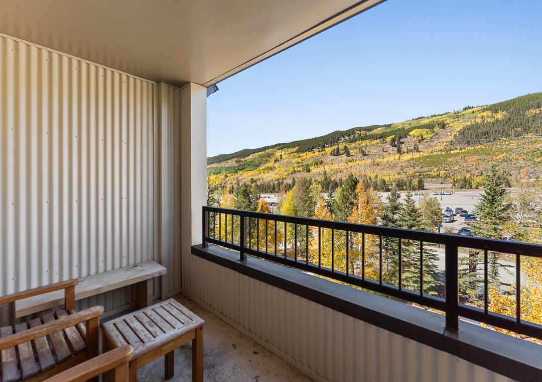 Step onto your private balcony and breathe in crisp mountain air while golden aspens paint the hillsides in autumn splendor.